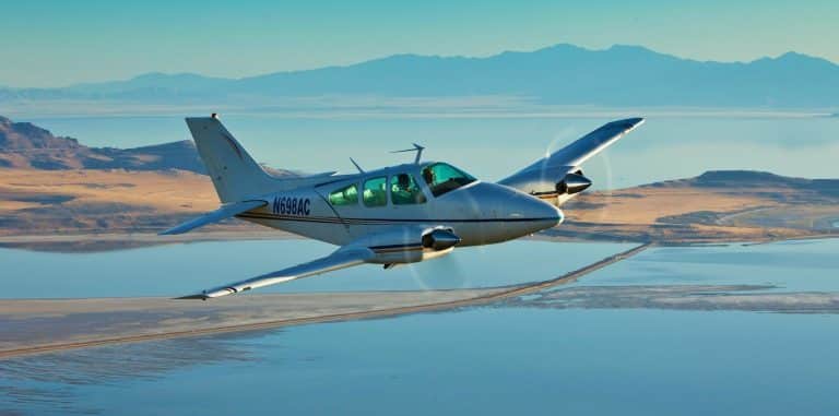 Twin engine aircraft flying above Salt Lake valley - Flying in Hot Weather: Density Altitude