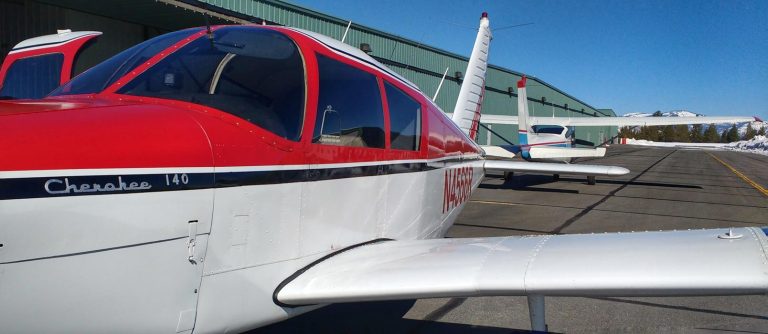 A low wing Piper Cherokee and high Wing Cessna 172